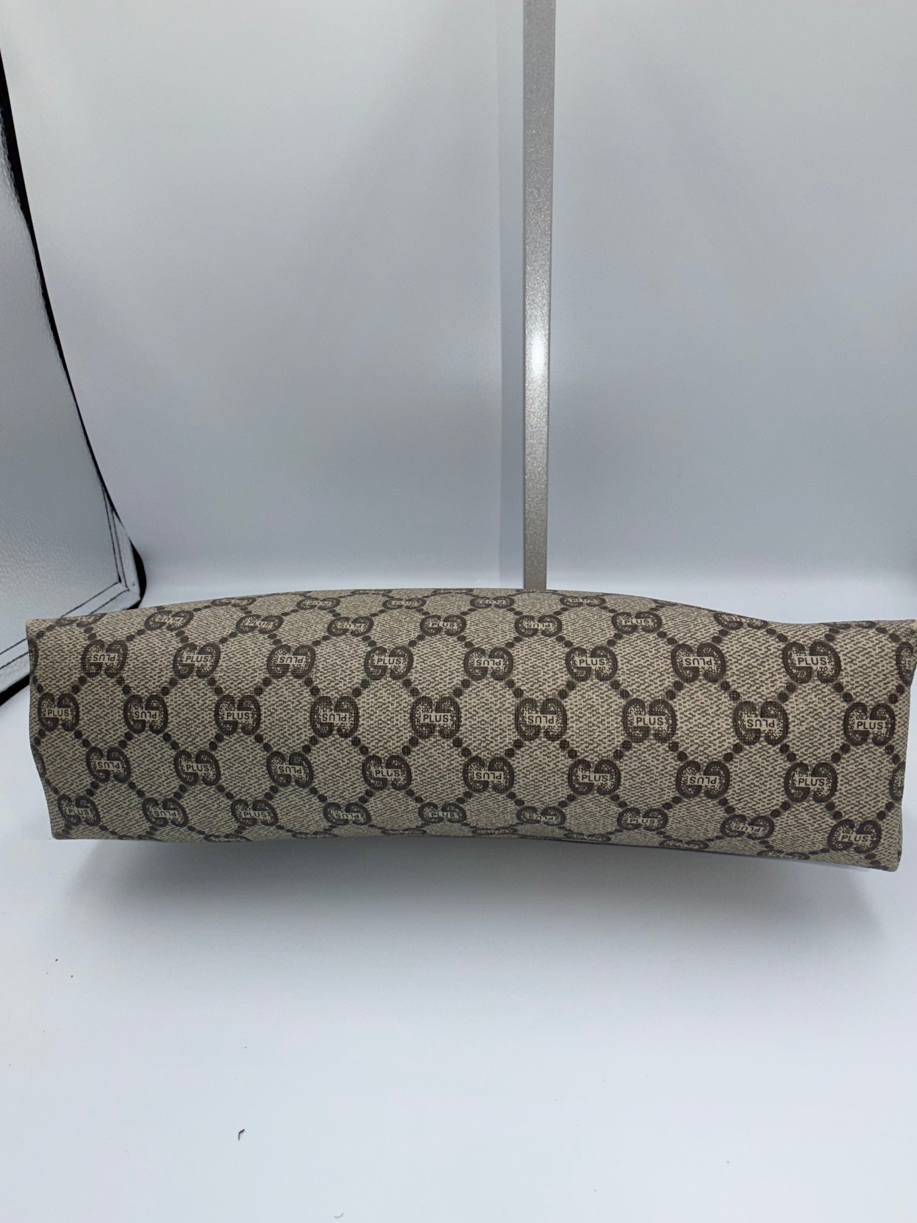 Gucci GG Canvas Clutch