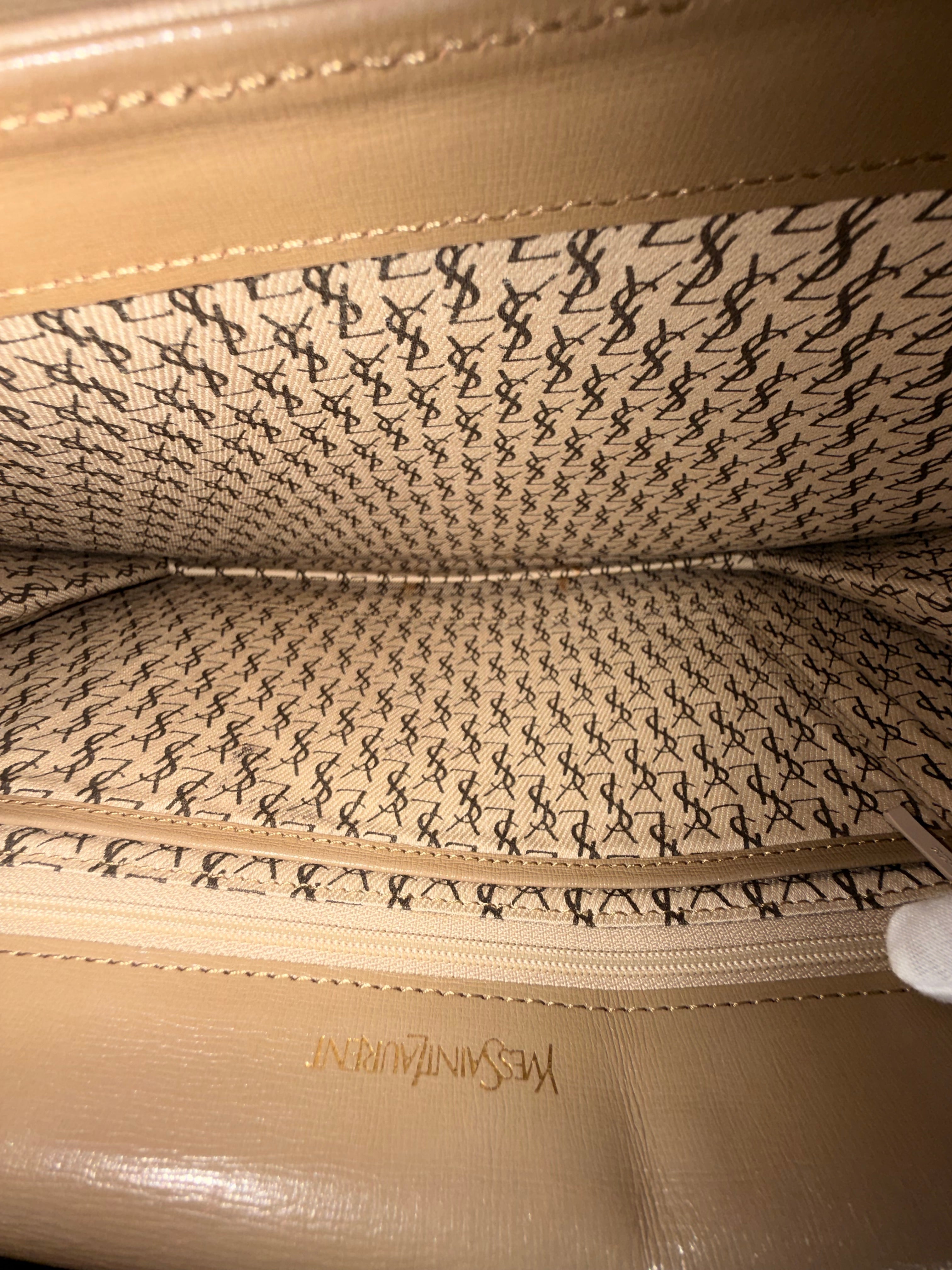 Yves Saint Laurent Monogram Canvas Clutch