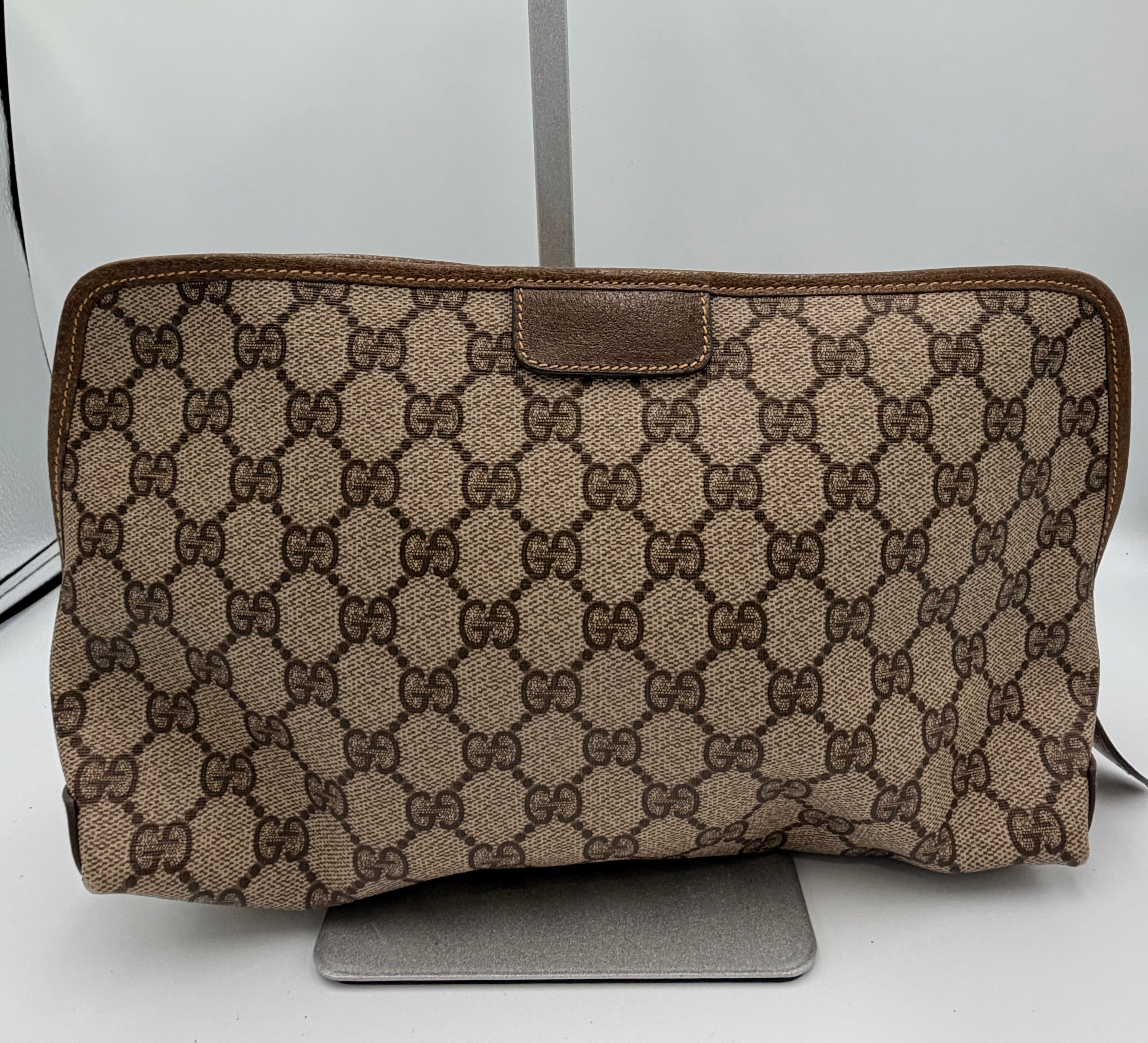 Gucci GG Monogram Zip Clutch