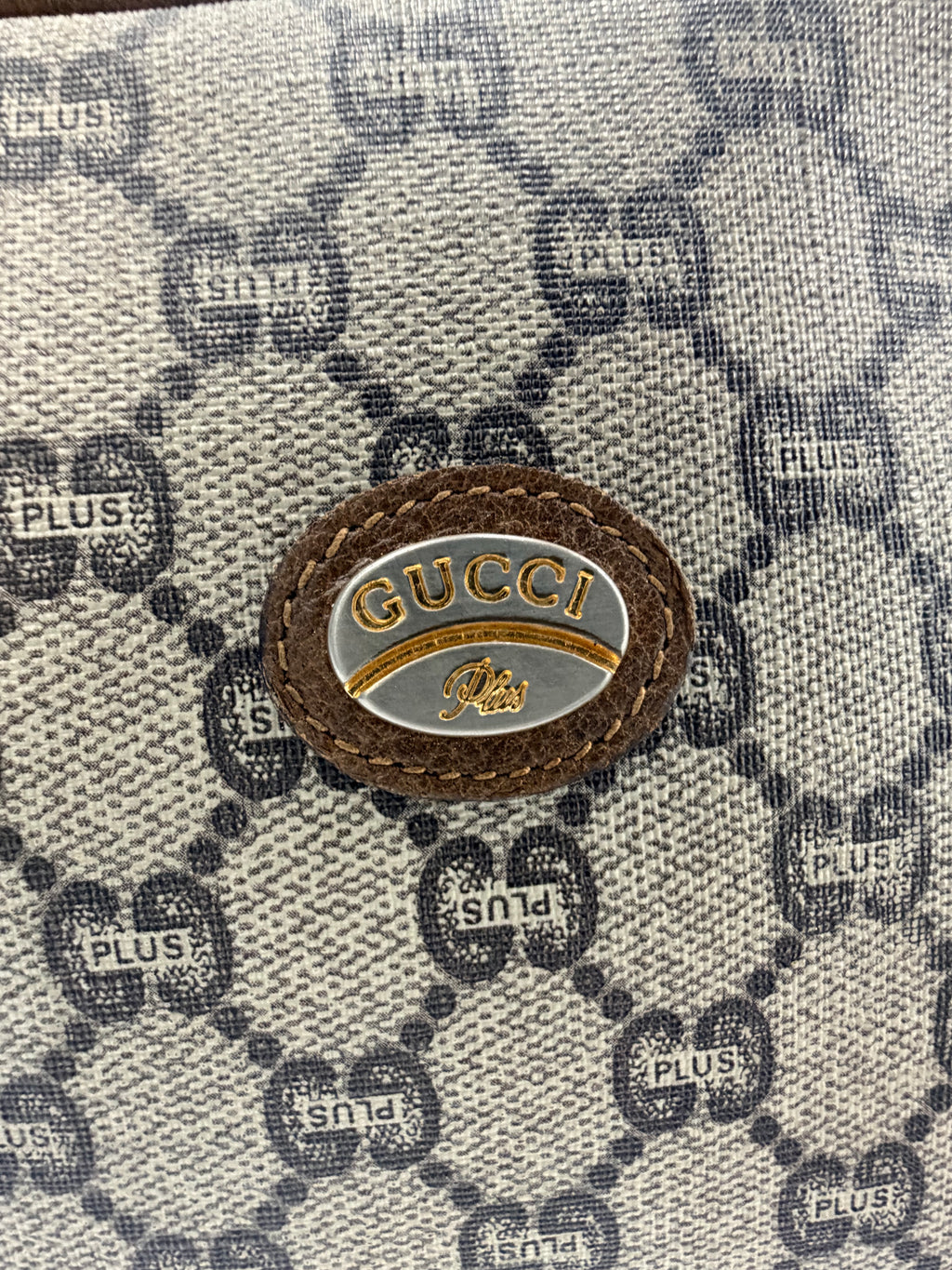Gucci GG Plus Wristlet Clutch