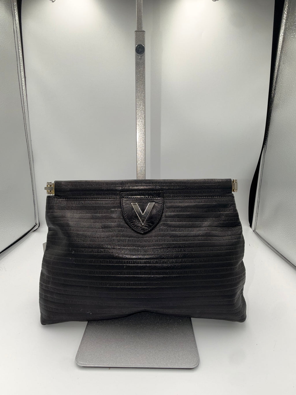 Mario Valentino Black Logo Embossed Clutch | Silver Hardware