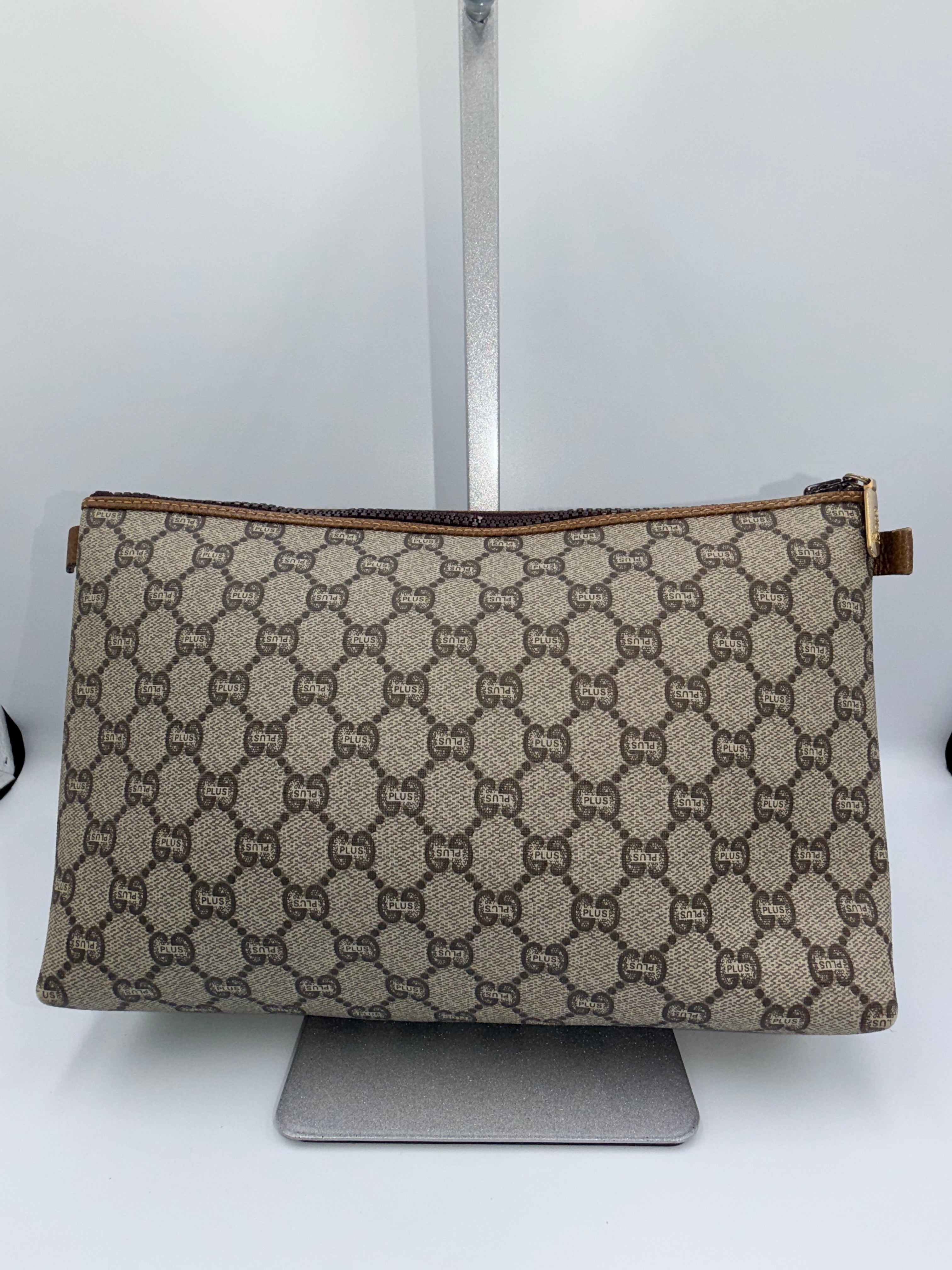 Gucci GG Canvas Clutch