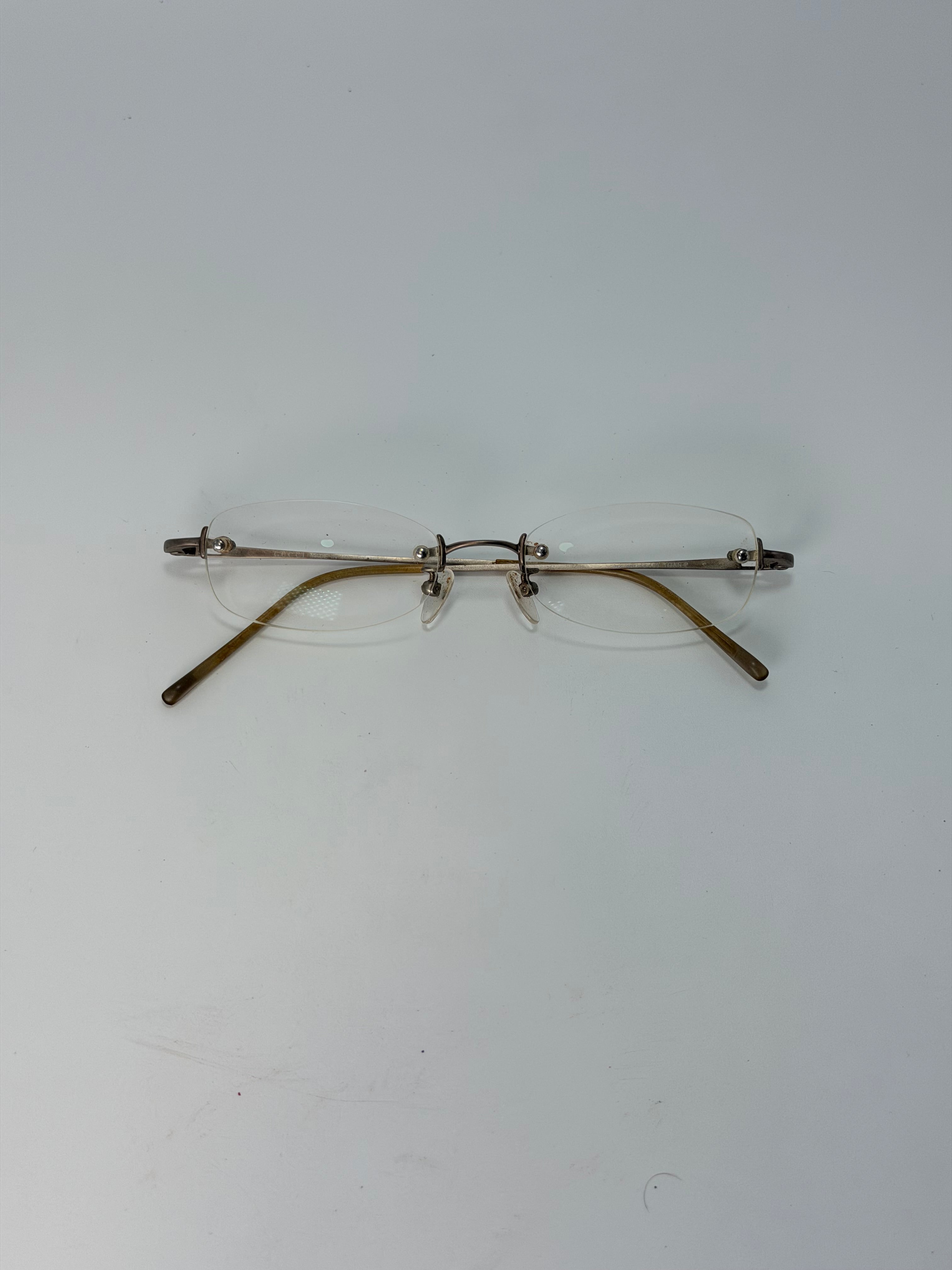 Gucci Rimless Eyeglass Frames – Silver Tone