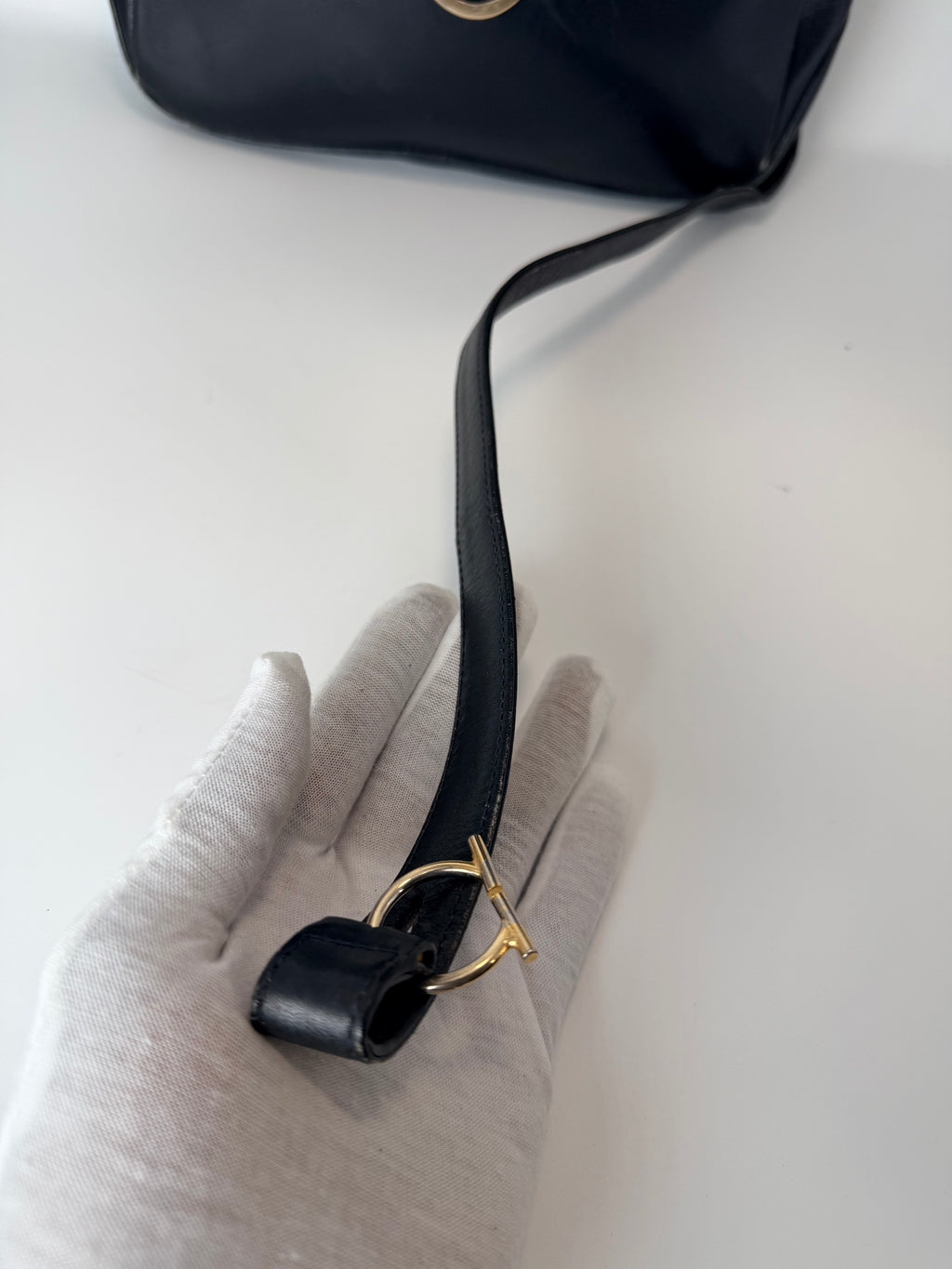 Gucci Black Leather Crossbody Bag with Gold Turn-Lock Hardware