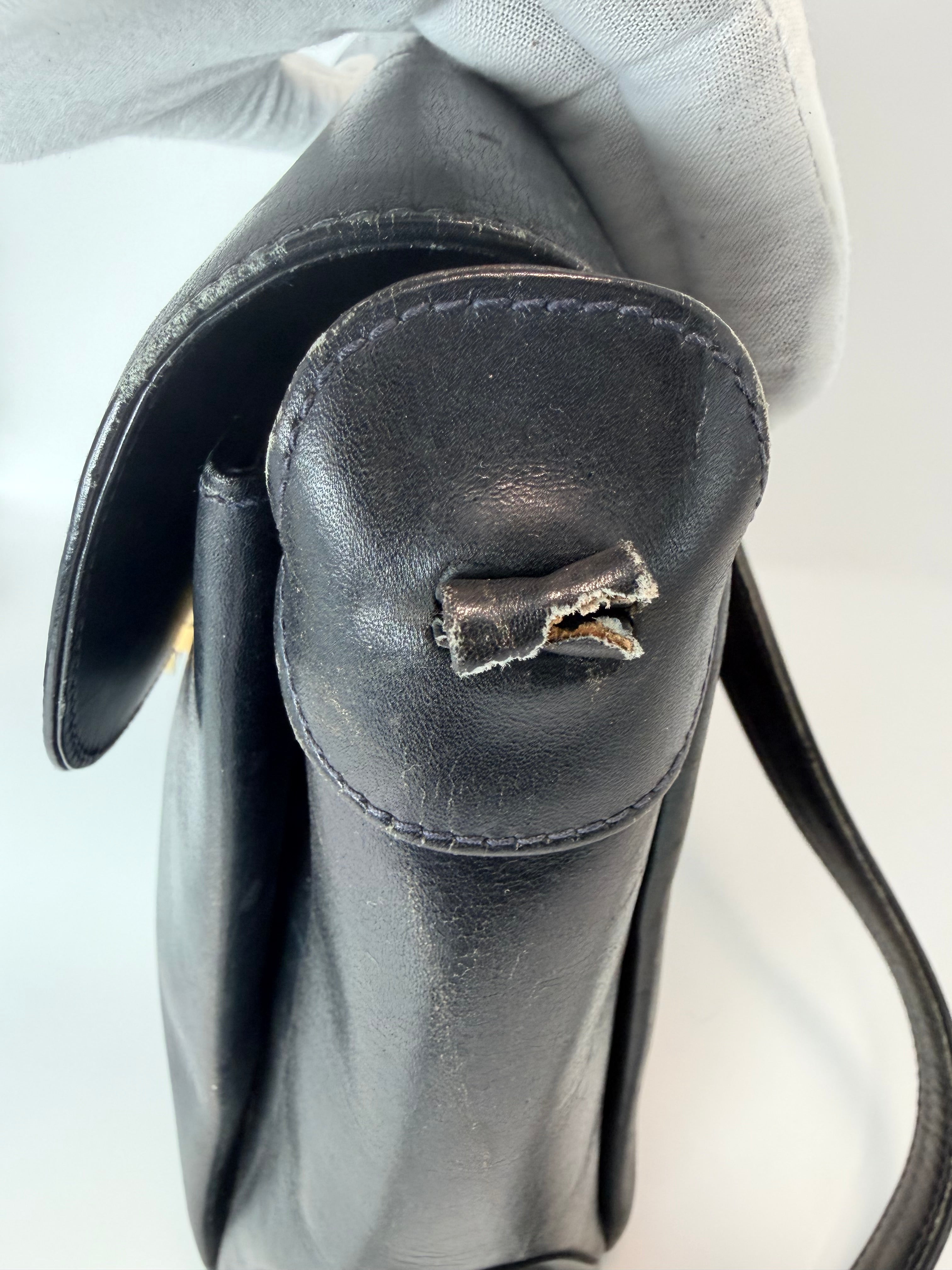 Gucci Black Leather Crossbody Bag with Gold Turn-Lock Hardware