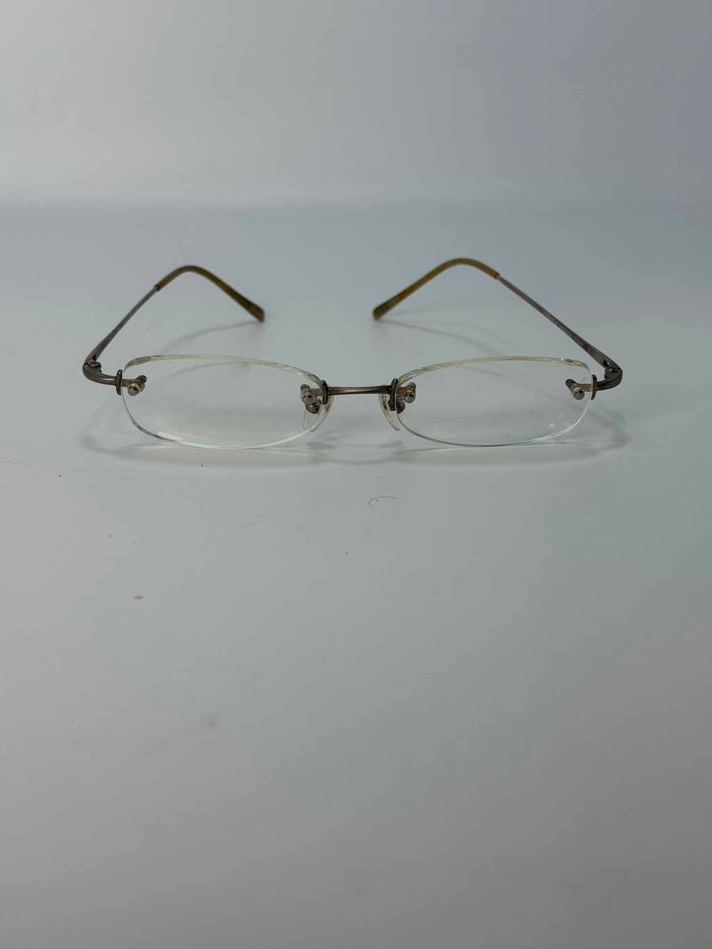 Gucci Rimless Eyeglass Frames – Silver Tone