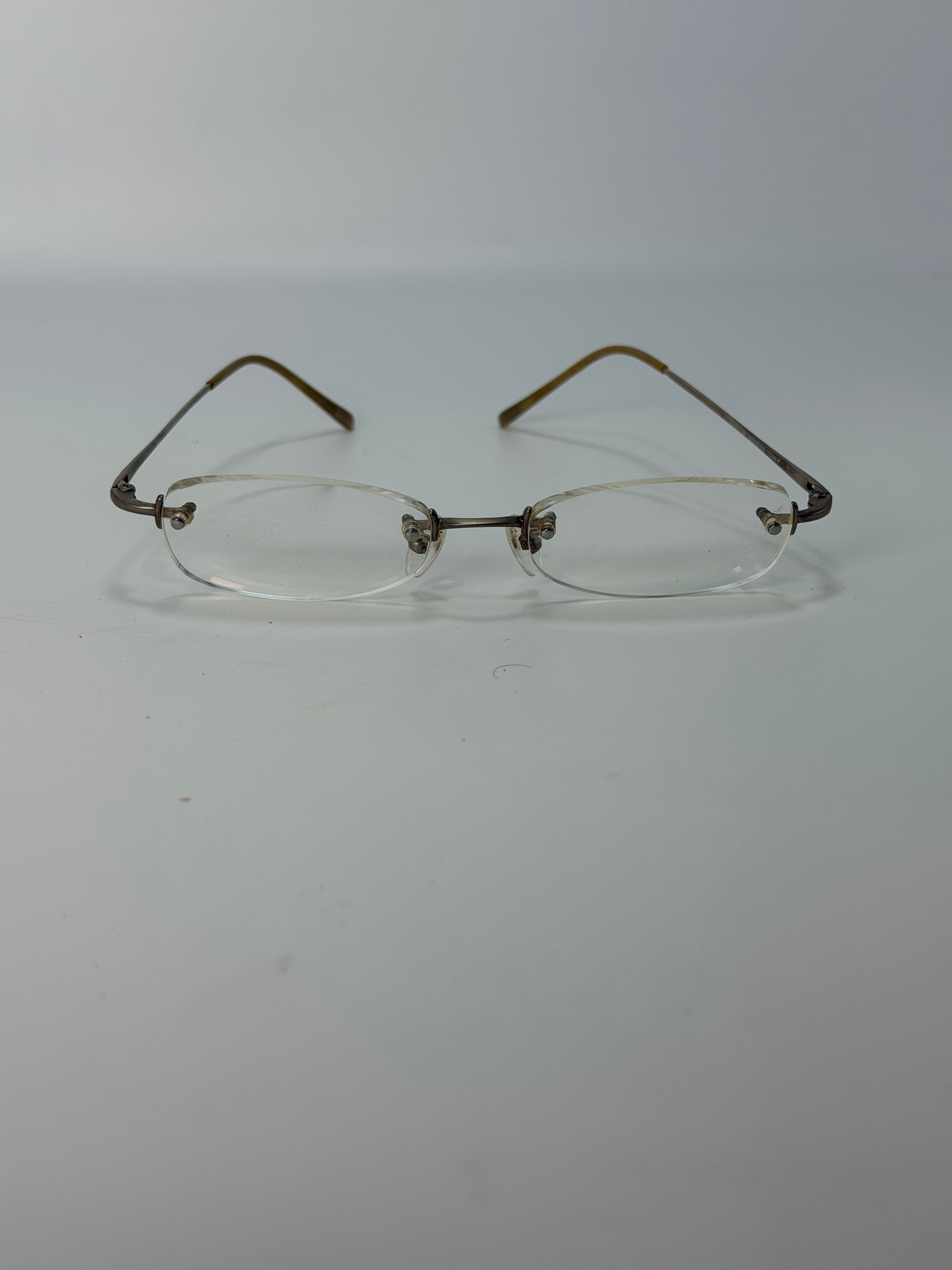 Gucci Rimless Eyeglass Frames – Silver Tone