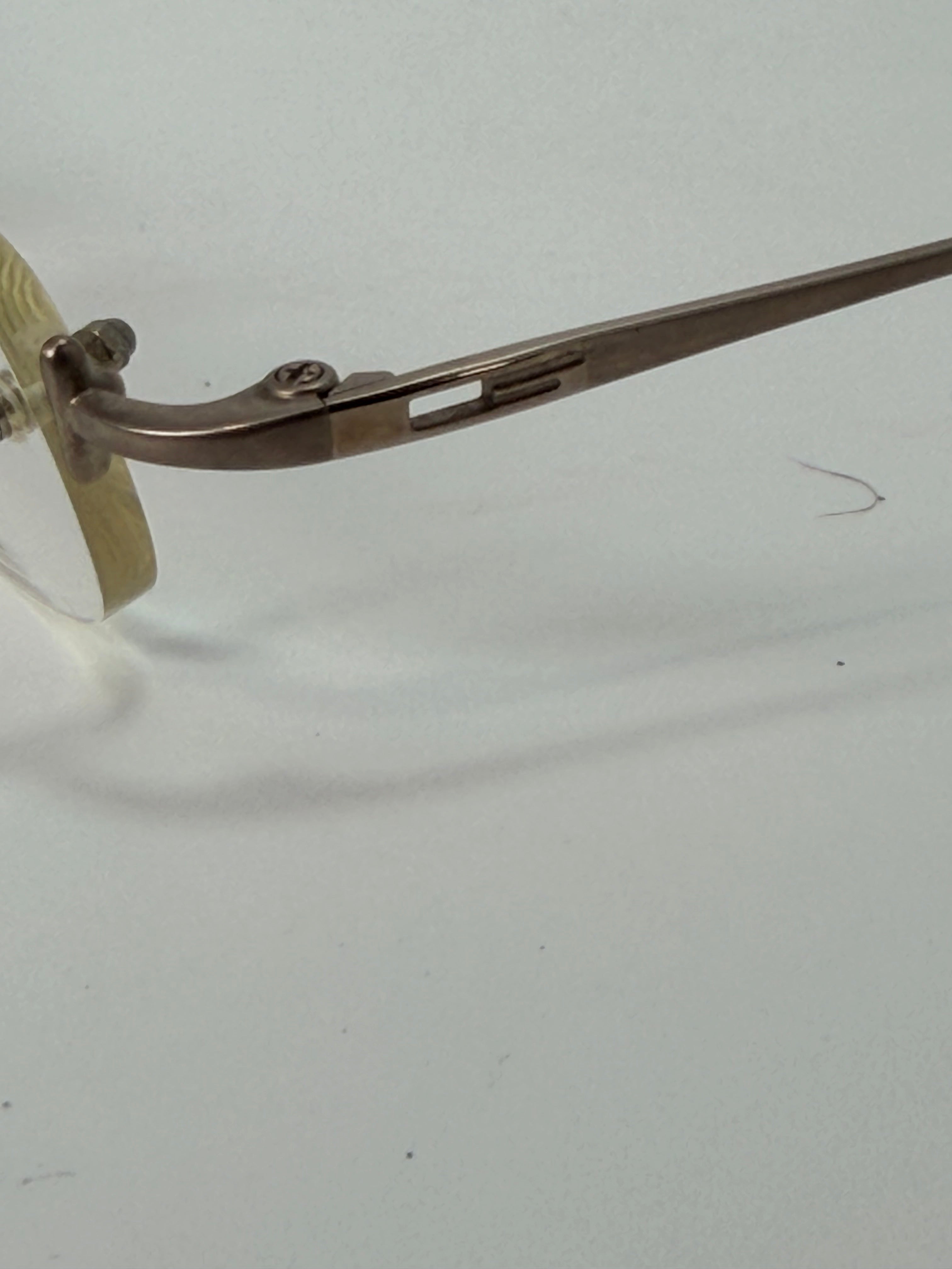 Gucci Rimless Eyeglass Frames – Silver Tone