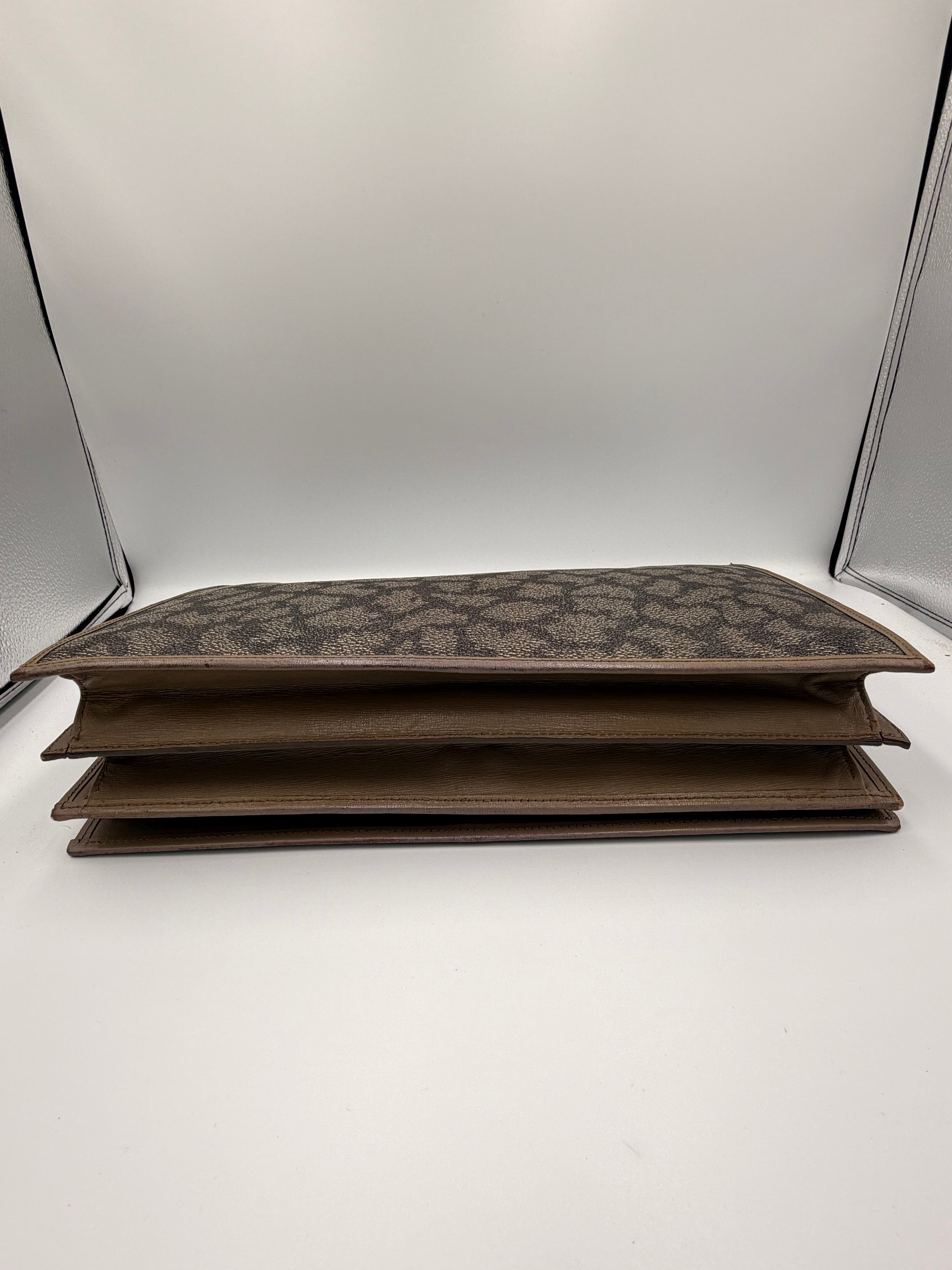 Yves Saint Laurent Monogram Canvas Clutch