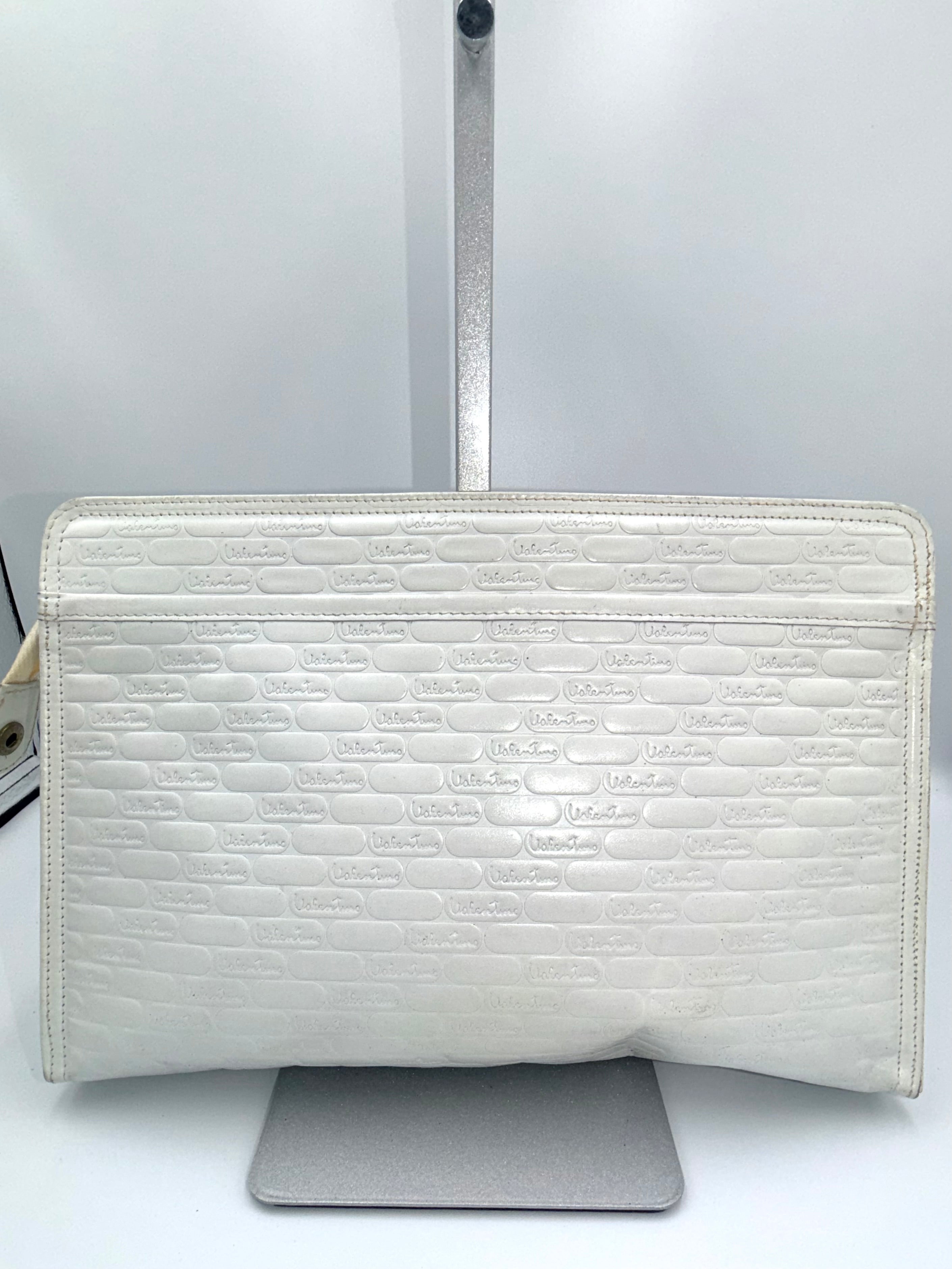 Valentino Garavani V Logo Embossed Clutch – Ivory