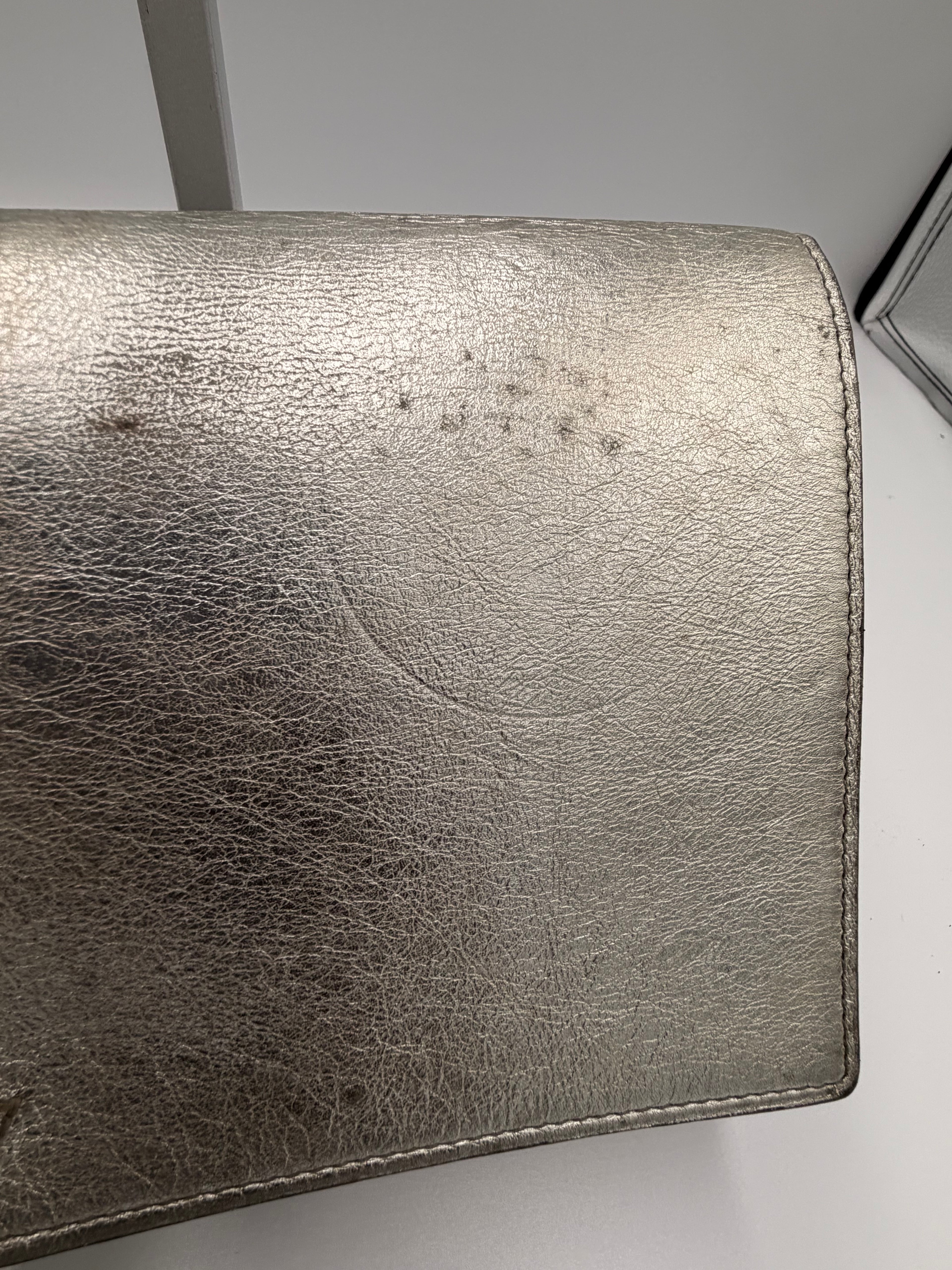 Yves Saint Laurent Metallic YSL Monogram Clutch (Silver/Gold Tone)